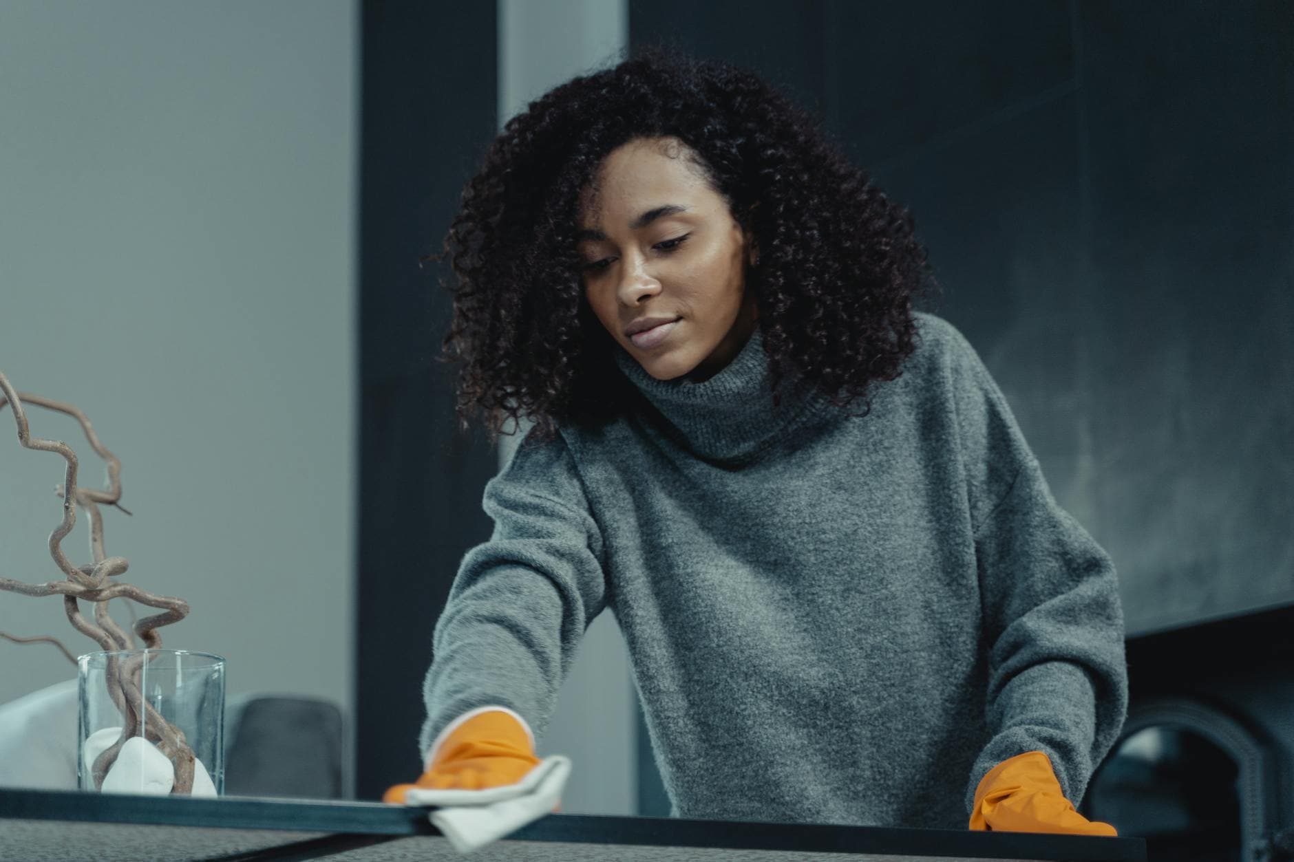 Your Business cleaner wiping a table in a New York City apartment — Your Business